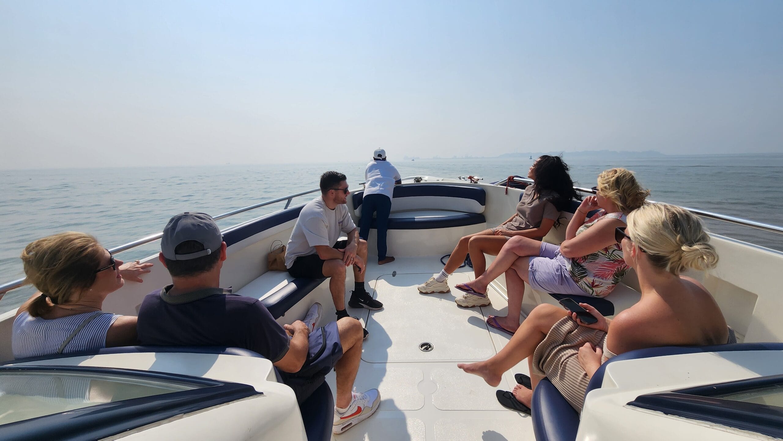 elephanta-cave-by-speed-boat-group-tour-tourists-on-speedboat Group of cruise passengers enjoying a private speedboat ride to Elephanta Caves from Mumbai Harbour