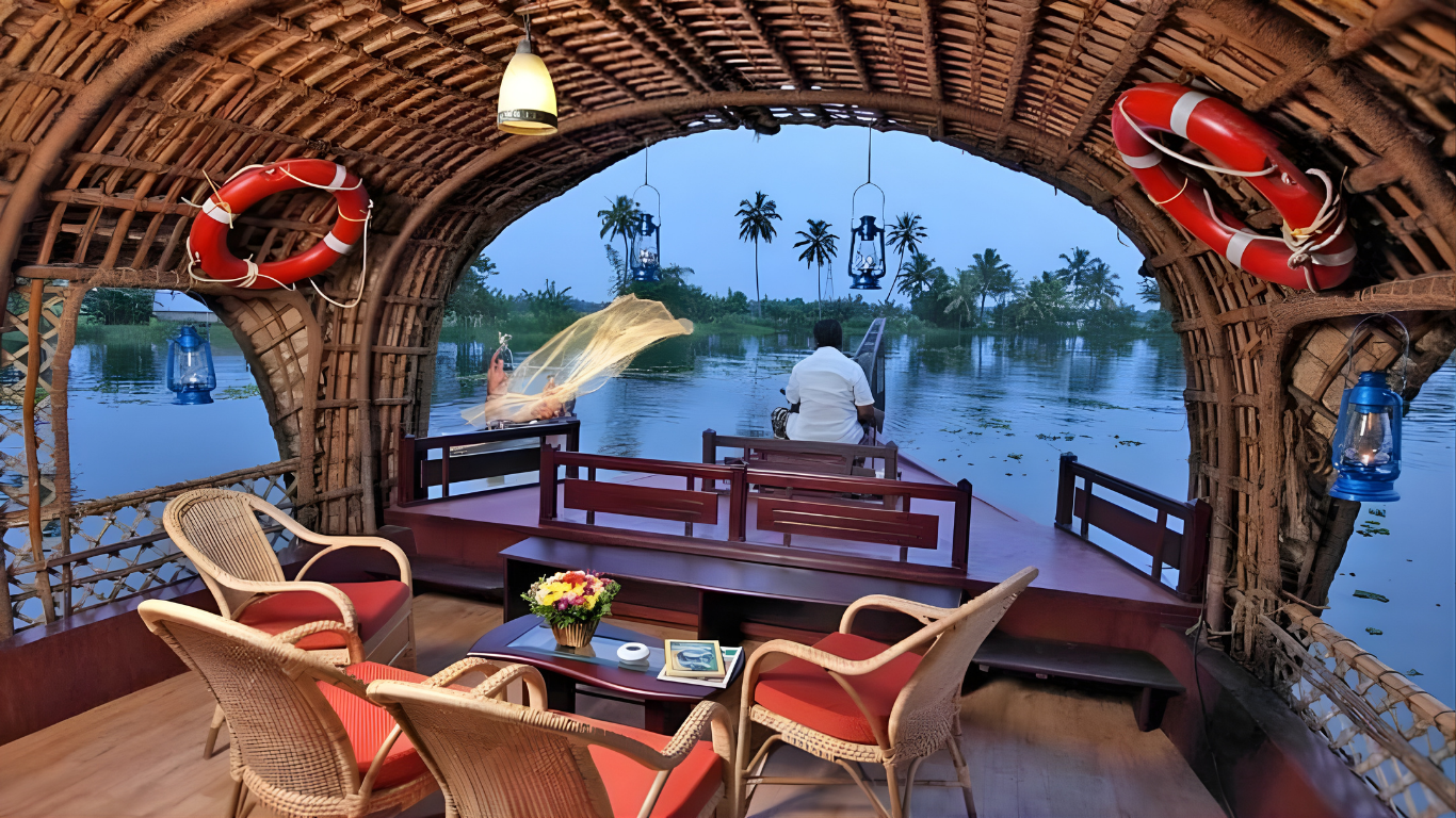 Evening view from a Kerala houseboat cruising through palm-lined backwaters