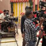 Bollywood film crew shooting a movie scene on a decorated set in Mumbai studio