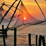 Chinese fishing nets at sunset along the waterfront of Fort Kochi, Kerala