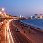Marine Drive at night with light trails, city lights, and Arabian Sea Mumbai