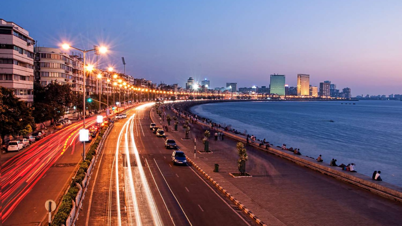 Marine Drive at night with light trails, city lights, and Arabian Sea Mumbai