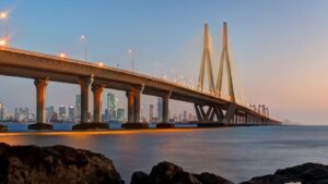Bandra Worli Sea Link illuminated in the evening with Mumbai skyline and sea