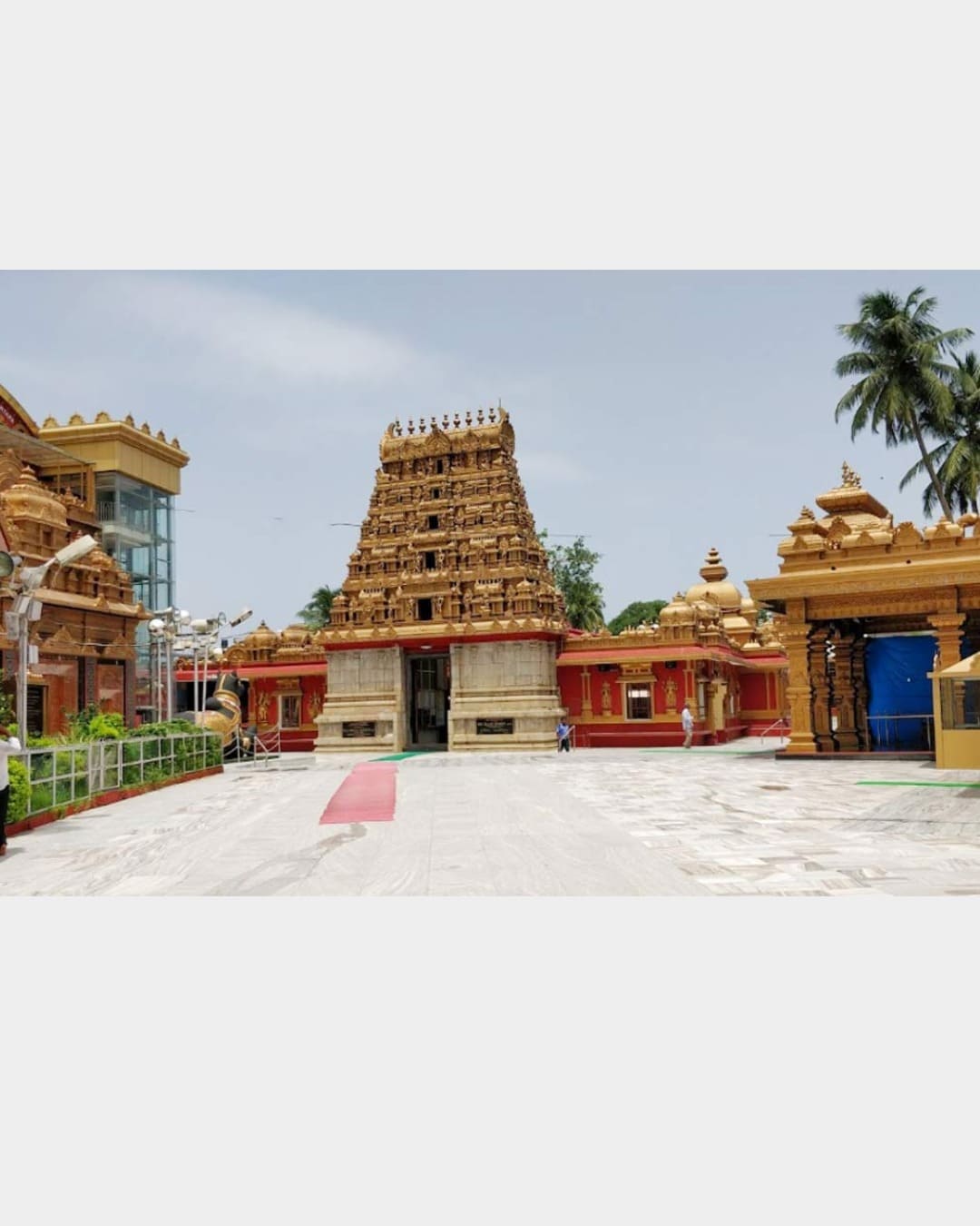 Prominent Hindu temple in Mangalore featuring an ornate golden gopuram and traditional Dravidian architecture