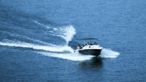 Premium speedboat traveling from Mumbai to Elephanta Caves across Mumbai Harbour, offering the fastest way to reach Elephanta Island.