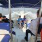 Travelers enjoying a speedboat to Elephanta Caves from Mumbai across the Arabian Sea
