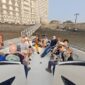 travelers boarding speedboat to Elephanta Caves Mumbai near Gateway of India
