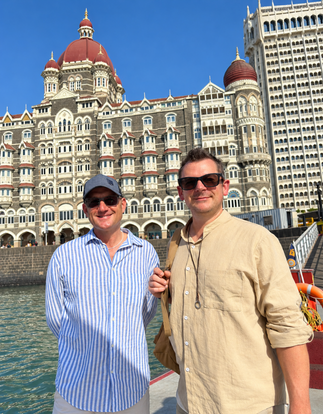 Guests boarding the shared speedboat with assistance in Mumbai