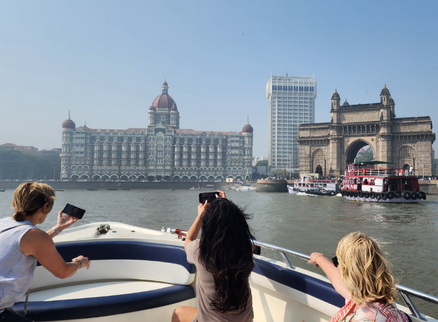 Guests returning from Elephanta Island to Mumbai by shared speedboat